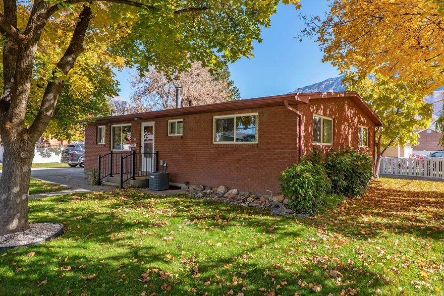 This one-owner home, built in the 1960s, sits on a spacious corner lot with mature trees and beautiful mountain views. It includes three bedrooms, two bathrooms, and a finished basement with a flex room that has been used as a bedroom (no closet). The all-brick exterior offers low maintenance, and the west-facing layout provides great evening shade from the trees. The property also features two driveways, auto sprinklers, and a storage shed that will stay with the home. Located in a quiet, established neighborhood, this home has solid bones and plenty of potential for its next owner.   Square footage figures are provided as a courtesy estimate only and were obtained from county records.  Buyer is advised to obtain an independent measurement.