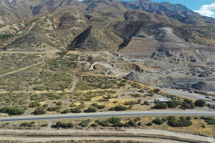 LOCATED BETWEEN SPRING LAKE & SANTAQUIN ON STATE STREET ON HWY 198.  PARCEL 30-094-0024 ACRES 5.939. LOTS OF FRONTAGE, INCLUDING A WELL  AND WELL HOUSE  (POTABLE),
