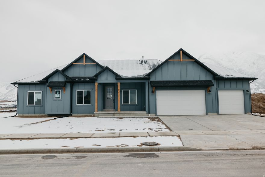 Needing a custom feeling home without the custom building hassle? Welcome to your solution. Our buyers don't need to: Buy the lot, get a construction loan, come up with a floorplan, not know what their home will actually cost or when it'll be done. We are you solution.  Meet the Atwood rambler - the home that believes bigger is better. This spacious rambler offers generous living areas, smartly utilized space, and sits on a flat, usable lot perfect for real life. Nestled among stunning 180 mountain views, you'll enjoy peaceful scenery while still being just minutes from the freeway, shopping, restaurants, and everything you need. Build this home to fit your custom needs and finally have space for all the things (and people) you love. Photos shown are of a modeled version of the Uinta floorplan. Actual finishes and colors may vary-ask your agent for details. Advertised price is base finishes only. Lot premiums, selected options and upgrades will increase cost.