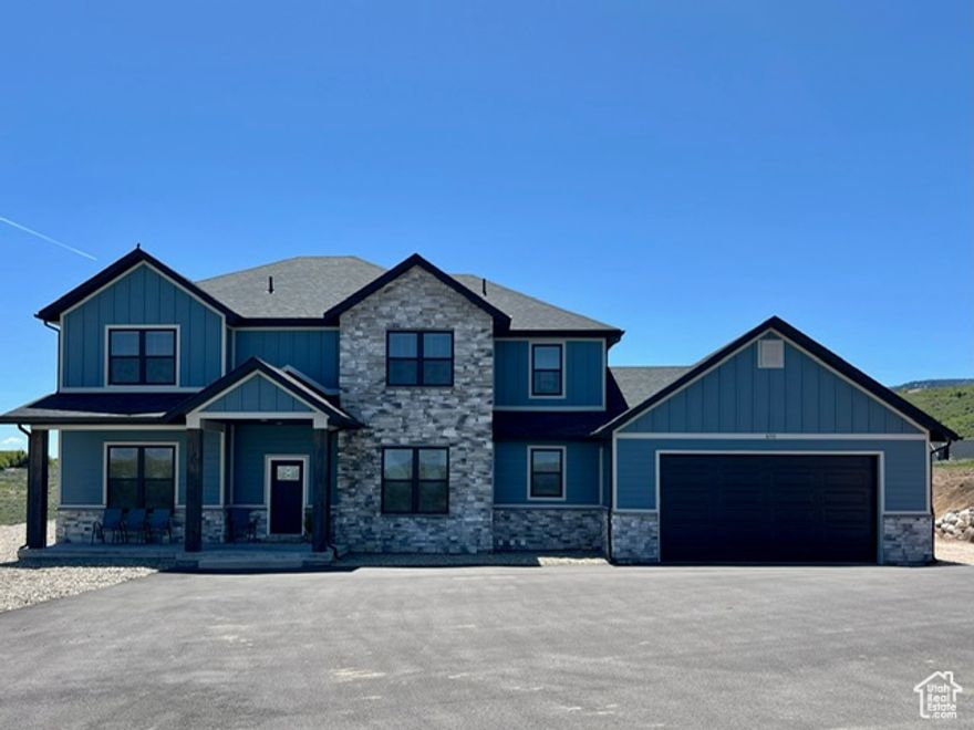 Exceptional investment opportunity in The Reserve at Bear Lake! This fully furnished property, with existing nightly rental bookings, offers year-round access and a prime location near upcoming HOA additional amenities (pavillion and pickleball courts). The main level showcases 3 bedrooms (2 ensuite), a bright, vaulted great room with a pellet stove and large sliding doors that open to the covered patio, and a gourmet kitchen with a double oven gas range and large fridge/freezer with ample eating areas. The upper level includes a loft, 4 bedrooms (2 ensuite), and two large bunk room areas with additional split bathroom. Additional features include a kids' playroom/game room, a 3-hole putting green, a hillside slide, and ample paved parking. Enjoy The Reserve's clubhouse, pools, and gated beach access. Outdoor enthusiasts will appreciate the proximity to Fish Haven Canyon and a short drive to Bear Lake State Park Marina (Garden City UT) and Beaver Mountain Ski Resort.