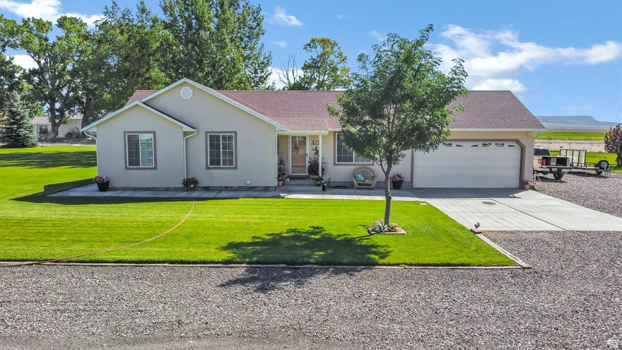 Discover this rare opportunity to own a spacious home in one of Loa's most desirable neighborhoods. Nestled at the end of a quiet, private cul-de-sac and surrounded by beautiful green pastures, this property offers both privacy and breathtaking views. With 5 bedrooms, 3 bathrooms, and over 2,763 sq. ft. of living space, this home was designed for both comfort and functionality. The oversized main living area creates a warm and inviting gathering space, while the loft with sweeping views provides the perfect retreat for an office, playroom, or lounge. The thoughtful floor plan allows for single-level living, making it convenient for all ages and stages of life. Set on 1.01 acres, the yard is a showpiece-fully landscaped and partially fenced for both beauty and practicality. Mature trees and manicured lawn create a stunning outdoor setting, ideal for summer evenings, barbecues, or simply relaxing and taking in the mountain scenery. Additional features include a generlink connection on panel (Generator Excluded), Connex and multiple storage sheds, giving you plenty of room for tools, recreational equipment, or extra storage needs. Whether you're dreaming of a small homestead, space for hobbies, or just more breathing room in the country, this property delivers. Rarely do properties like this come available in Loa-don't miss your chance to make it yours!