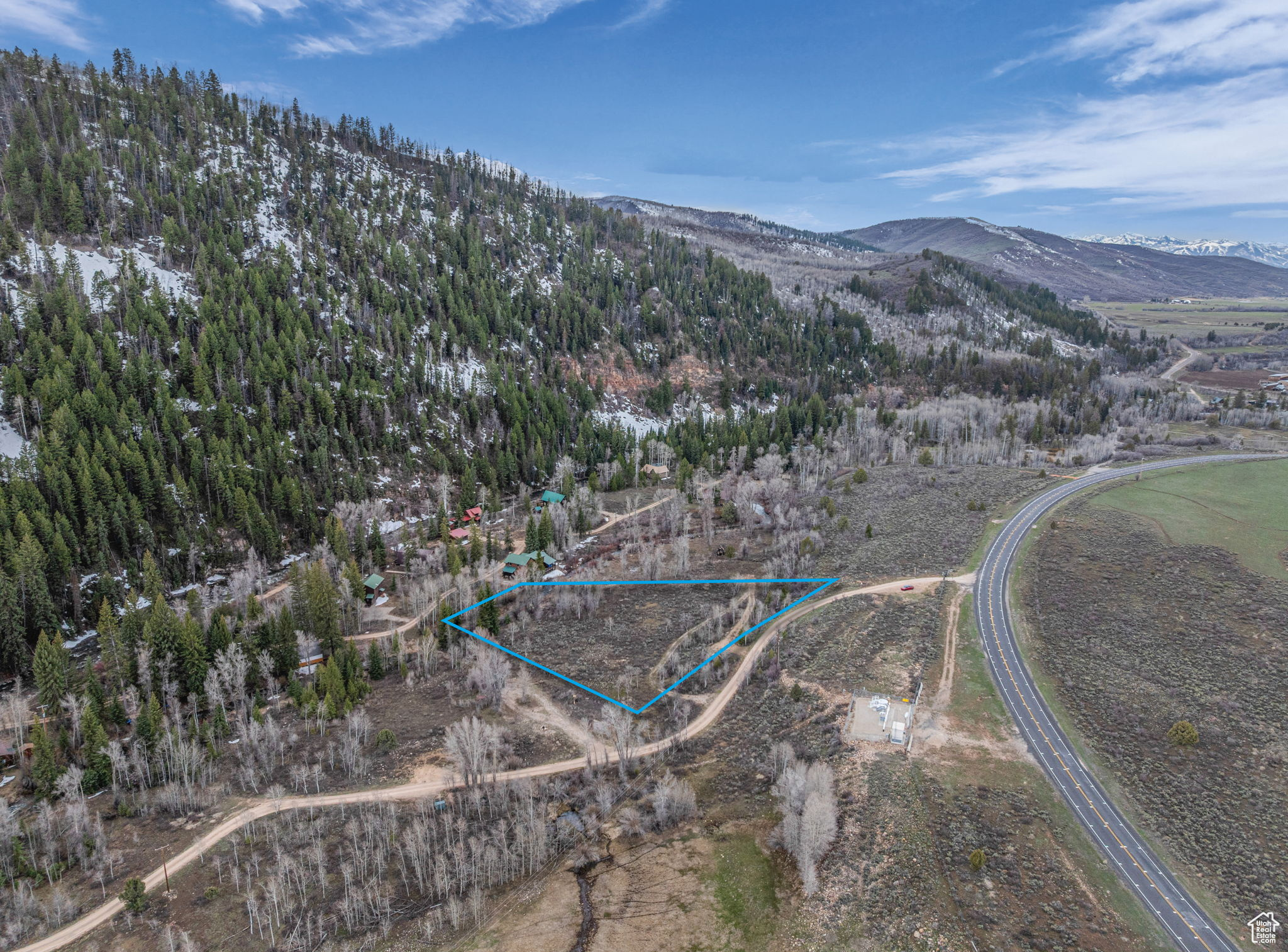 Discover an exceptional opportunity to own 1.9 acres of flat, vacant land along the pristine Provo River, offering year-round access and world-class fly fishing right at your doorstep. This stunning parcel is a haven for outdoor enthusiasts, with endless opportunities for recreation. Despite its serene, nature-immersed setting, the property is conveniently located just minutes from modern amenities, blending the best of tranquil seclusion and urban accessibility. Build your dream retreat or investment property on this rare opportunity.