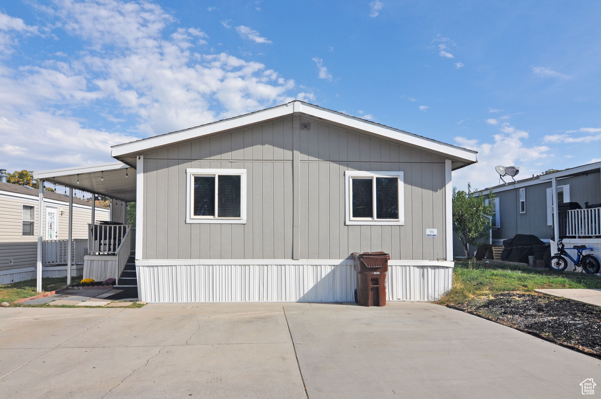 You won't want to miss this stunning, updated, mobile home! This double-wide mobile home has everything you could need with 3 bedrooms, 2 full bathrooms, a covered deck, a fenced backyard, a large shed for storage, and installed Smart Home features. You will love watching YouTube on the kitchen fridge while you cook on your modern gas stove. Wow, your guests by playing music in installed smart speakers, and never again come home to a cold house. With the smart features, you can easily control the temperature remotely from your phone. This mobile home is nestled in a quiet, peaceful mobile home community, while still located within minutes of shopping centers. The community also boasts a lovely community pool and large outdoor recreational space. Don't miss your chance to own this beautiful mobile home! $700 home warranty plan will be included in sale!