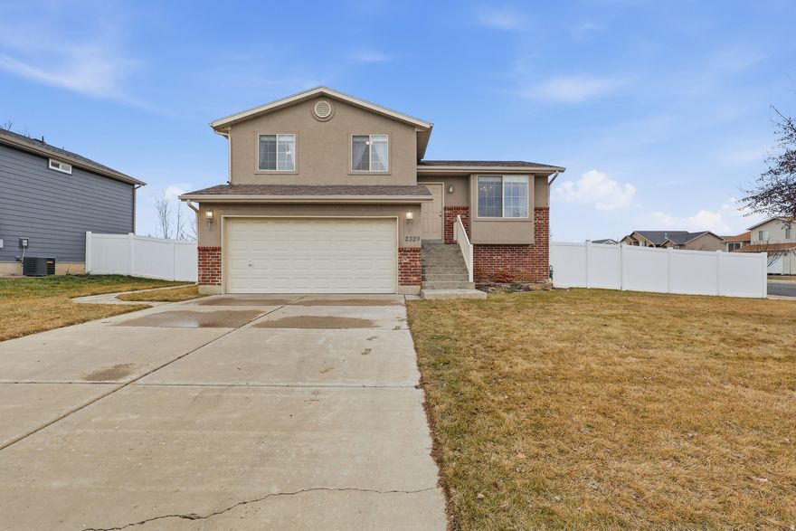 This well-maintained Clinton home offers flexible space, thoughtful upgrades, and room to grow. All in a convenient location close to parks, schools, shopping, and Hill Air Force Base.  The upstairs features a comfortable layout with a spacious primary suite complete with its own private bathroom, creating a relaxing retreat at the end of the day. On the main level, the kitchen is highlighted by beautiful granite countertops, providing both style and durability for everyday living and entertaining.  Downstairs, you'll find additional space with a finished room that could serve as a home office, hobby room, or potential bedroom depending on your needs. The laundry area is already rough plumbed for an additional bathroom, offering future expansion opportunities and added functionality.  Whether you're looking for move-in ready comfort or a home with potential to personalize over time, this Clinton property provides flexibility and long-term value. Schedule a private showing today!