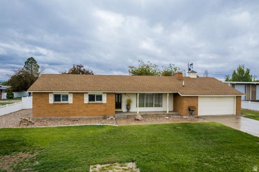 Full of Charm and immaculately maintained 3-bedroom, 1.5-bath home on .58 acres offering comfort, space, and timeless appeal. Pride of ownership shines throughout with a warm, inviting layout. Enjoy a beautifully landscaped, fully fenced yard creating a private outdoor retreat. The impressive 40x30 shop adds exceptional versatility for toys, projects, or storage. A rare find with this level of care and usable space. Close to Town and Amenities.  Square footage figures are provided as a courtesy estimate only and were obtained from County Records. Home Being Sold AS-IS.  Buyer and Buyer's Agent to verify all information. Buyer is advised to obtain an independent measurement.