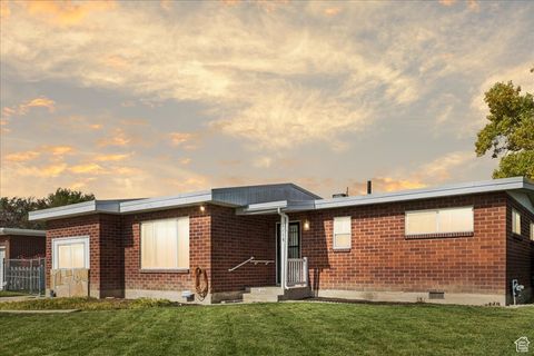 Photo of 3110 W LEMAY AVE S, West Valley City, UT 84119 (MLS # 2117834)