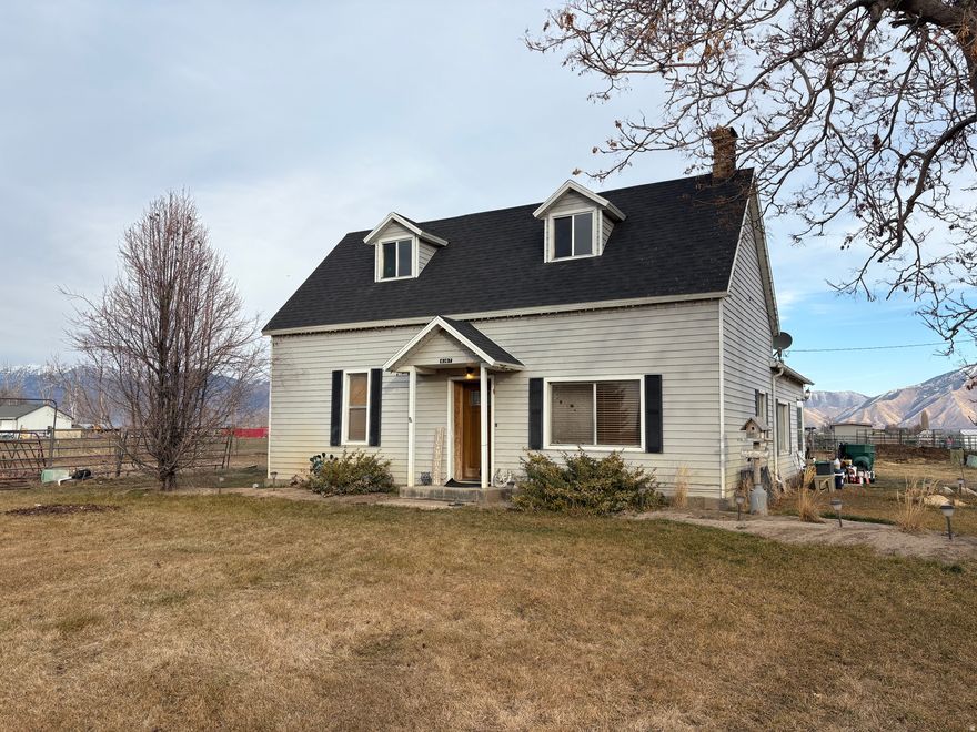 Rare opportunity in Lake Shore! This unique property sits on approximately one acre and is legally grandfathered as a farm, exempt from the five-acre agricultural requirement-an extremely uncommon designation in Utah County. The property includes a private well located on-site, offering valuable water rights and added self-sufficiency. The existing home provides peaceful rural living with wide-open views, privacy, and space for animals, gardening, or small-scale agricultural use, all while being minutes from town conveniences. Ideal for buyers seeking country lifestyle flexibility, investment potential, or a hard-to-find acre parcel with agricultural rights already in place. Buyer to verify all uses, water rights, and well details with the county.