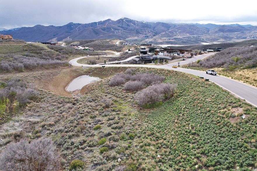 Nestled within the prestigious Tuhaye community, 1922 E. Dancing Sun Drive presents a rare opportunity to create a custom mountain retreat in one of Utah's most sought-after private enclaves. This homesite offers a serene setting surrounded by natural beauty and year-round recreation.  The property includes a coveted full membership to Talisker Club-providing exclusive access to four world-class amenity venues, including the Mark O'Meara-designed golf course, private ski-in/ski-out access at Deer Valley, and an elevated collection of dining, wellness, and outdoor experiences.  With generous building envelopes and seamless access to Park City, this is an exceptional opportunity to design and build a legacy home that fully embraces the luxury mountain lifestyle.