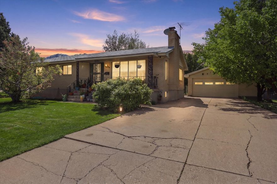 This 5-bedroom, 2-bathroom home on a 0.3-acre lot in a convenient Brigham City location near the High School, is ready for its new owners!   This well-maintained home offers a functional layout with plenty of natural light and room to grow. Enjoy a large yard with mature landscaping, ample parking, and a detached garage for added storage or workspace. Relax on the front porch with beautiful mountain views and evening sunsets.   Close to schools, parks, and local amenities- this home offers both comfort and convince.