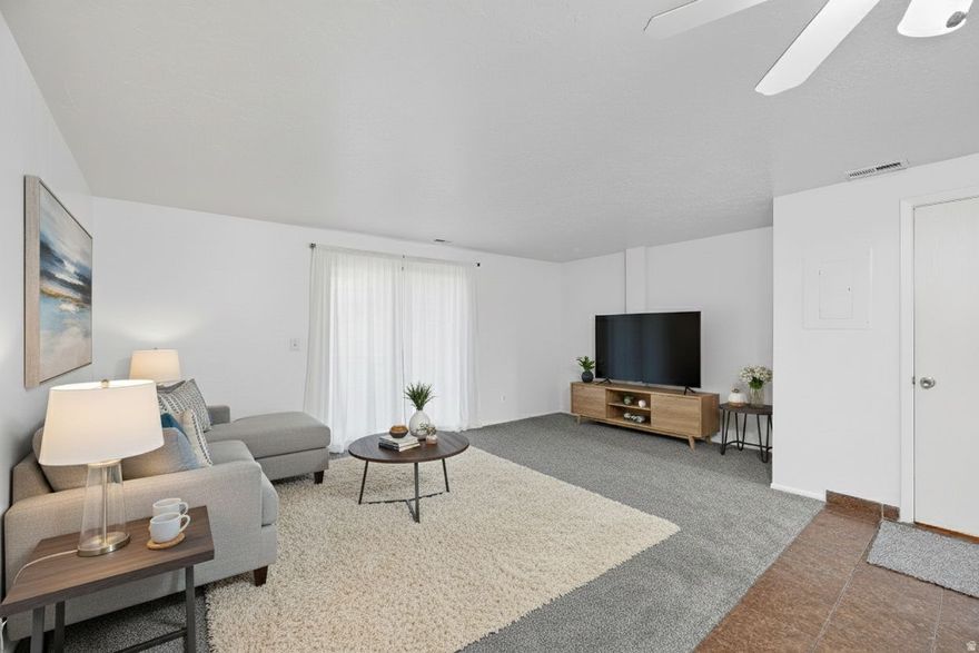 This charming and affordable 2-bedroom, 1.5-bath condo offers comfort, convenience, and a central location. Enjoy an assigned covered parking spot and easy access to downtown dining, schools, and skiing. The split-entry layout places main living spaces, kitchen, dining, and living room, on the lower level, which is partially below grade, with bedrooms upstairs. The fully finished basement includes a half bath.  Ideal for buyers seeking a low-maintenance lifestyle, this home combines functionality with proximity to everything Ogden has to offer. Other units currently listed include #52, with additional units expected to hit the market soon. Buyers should contact their agent for more information. Square footage is per MLS guidelines; buyer to verify.