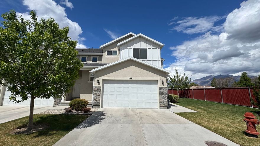 This desirable end-unit townhouse offers beautiful mountain views in a remarkably quiet setting while remaining conveniently close to Target, Walmart, Cafe Rio, and a wide variety of shopping and dining options. The thoughtfully designed floor plan features 4 bedrooms and 3.5 bathrooms, including a finished basement that provides flexible living or recreation space. Enjoy low-maintenance outdoor living in the astroturfed backyard, perfect for relaxing or entertaining. With its combination of comfort, functionality, and convenient location, this home is ready for its next owner to enjoy this spring.  Square footage figures are provided as a courtesy estimate only and were obtained from county records .  Buyer is advised to obtain an independent measurement.  Listing is for informational purposes only, and all items to be verified by the buyer. Home is financed on a VA Loan, and may be assumable