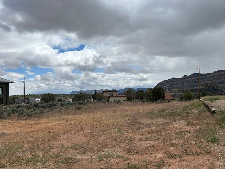 Great 1/2 Acre Building Lot with Beautiful Views of the Escalante Canyons! Located in the Heart of the Grand Staircase Nat'l Monument. Within minutes of trails, canyons, mountains and lakes. Enjoy the scenic beauty, historic sites and wide open spaces. Bring the toys and ride from your lot. Utilities are in the street, water meter can be applied for with Town of Escalante. No HOA, bring your own builder ! Lot size is .46 Acre