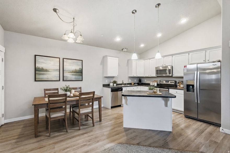 Experience peaceful, low-maintenance living in this move-in-ready, top-level condominium with beautiful mountain views from every window.   This well-cared-for 3-bedroom, 2-bath home features vaulted ceilings that create an open, airy feel, paired with beautiful touches and thoughtful finishes throughout. Pride of ownership shines in every detail.  Enjoy a worry-free lifestyle with newer stainless steel appliances, included refridgerator, and HOA coverage that takes care of exterior maintenance, landscaping, water, sewer, trash, snow removal, and insurance.  Located in a desirable Centerville community offering a pool, parks, playgrounds, and picnic areas, this home blends comfort with convenience. Just minutes from Centerville Plaza, shopping, dining, and easy freeway access-everything you need is right nearby.  Whether you're a first-time buyer or looking for a turnkey opportunity, this cheerful and well-maintained home is ready to welcome you.