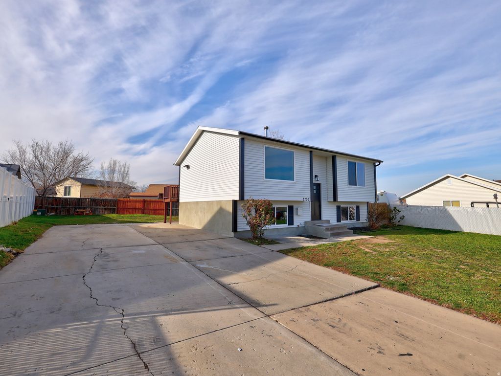 Photo of 3706 S BUCKEROO CIR, Magna, UT 84044 (MLS # 2128514)
