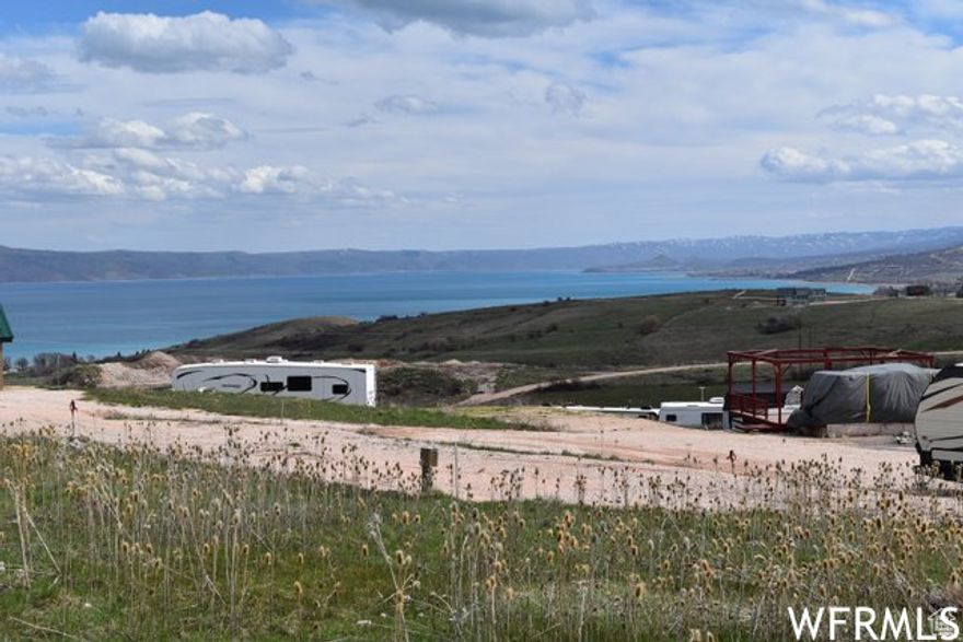 Own your own deeded RV lot in beautiful Bear Lake just north of Fish Haven, Idaho! Enjoy the mountain setting with beautiful view of Bear Lake! Ride directly to Fish Haven Canyon! Close to North Beach State Park. Water is in the road, sewer is a dump station at park entrance. Needs water brought in and lot leveled by the Buyer. POA fee covers all water and power usage, sewer (dump station), Garage, Road & comfort stations maintenance, upkeep and supplies! Come Relax and enjoy your home away from home!