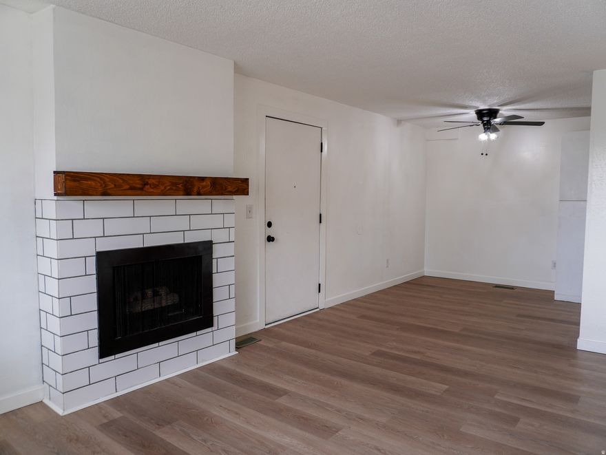 This cozy condo is located in a quiet area of South Salt Lake. Top floor, 2 bedroom, 1 bath condo. Brand new LVP flooring and new carpet in bedrooms. Features a fireplace in the living room, large bedrooms, storage area, pool, and is close to downtown. HOA takes care of exterior maintenance and insurance, water, sewer, and garbage. Square footage figures are provided as a courtesy estimate only and were obtained from county records. Buyer is advised to obtain an independent measurement.