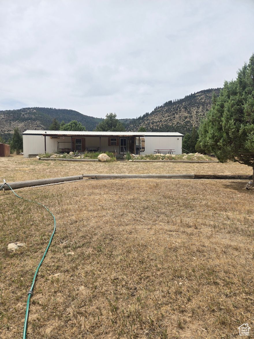JOE'S VALLEY PROPERTY!! Beautiful Mtn property. Views are amazing. Close to fishing, Mountain biking, ATV trails and world famous for rock climbing . 1 share of irrigation water and 1 share of culinary water (well). This property will not be on the market long, act now before deer hunting is over. Call for your showing.  Square footage figures are provided as a courtesy estimate only and were obtained from owners.  Buyer is advised to obtain an independent measurement.