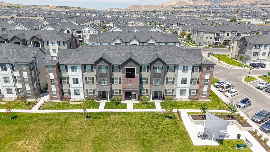 Top-Floor 3 Bed, 2 Bath Condo in Lehi. Enjoy breathtaking mountain views from this home. This condo offers access to fantastic community amenities, including parks, a pool, pickleball courts, and a clubhouse with a gym. Spacious open layout, ideal for entertaining, with 3 generous bedrooms and 2 well-appointed bathrooms. featuring 9-foot ceilings, ample storage space and beautiful finishes throughout. Enjoy the convenience of living close to your favorite restaurants and stores, like Costco and the Outlets at Traverse Mountain. This home also has convenient access to schools, Intermountain Primary Children's Hospital, Thanksgiving Point, Olympic Park, Jordan River Trail, Lehi Skate Park, and I-15.