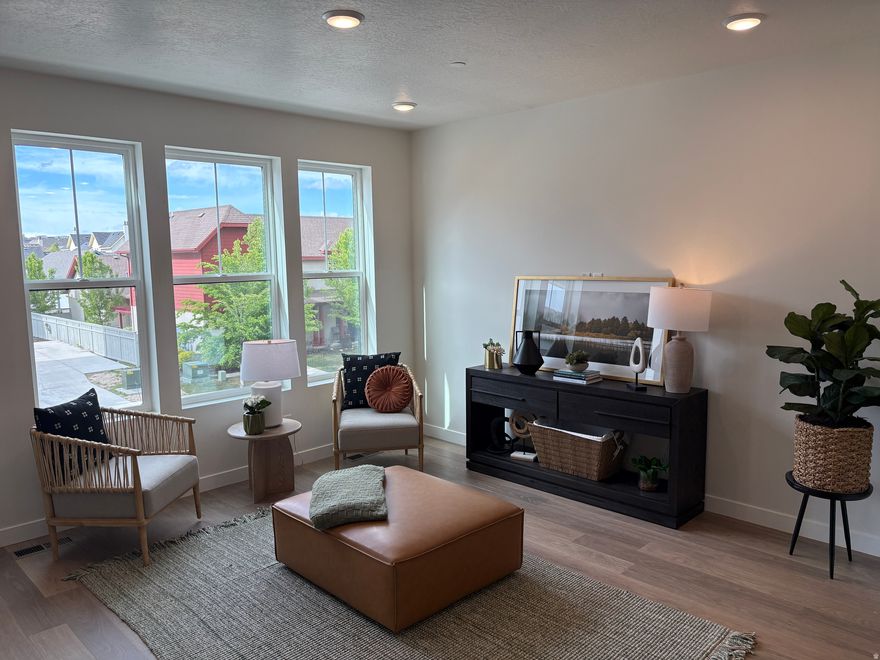 Move-In By End of Month! Enjoy living in a location that puts you close to it all!  Walk to Soda Row, Oquirrh Lake, the library, and America First Square Stadium. The area is known for community events and a lively neighborhood feel, with limited nearby construction. Inside, large, well-placed windows bring in abundant natural light and highlight incredible mountain views. The home is designed to feel bright, open, and connected to its surroundings. Move in before summer and start enjoying everything the neighborhood has to offer. In-house lending options help make the home buying process simple and straightforward. ASK ABOUT OUR UNADVERTISED INCENTIVES!