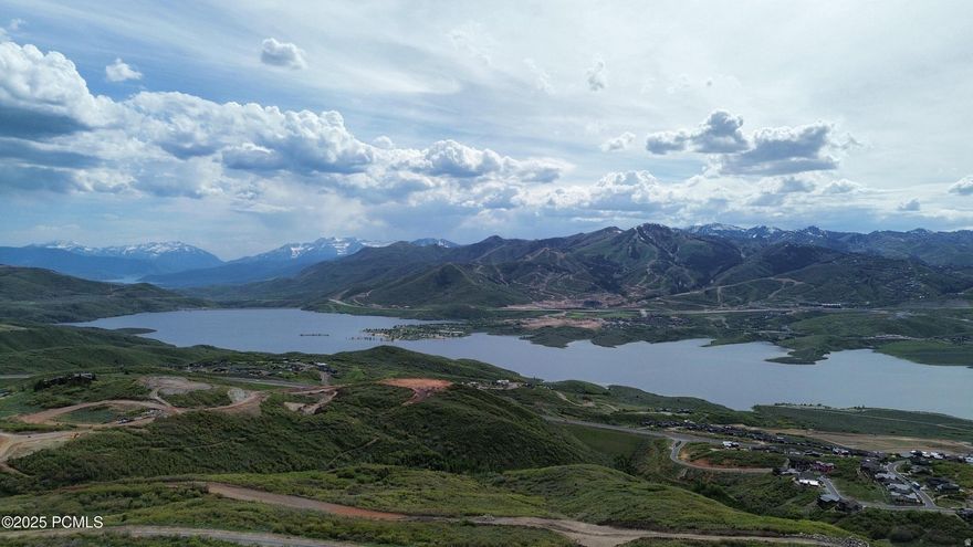 This is a rare and ideal downhill lot with stunning panoramic views stretching from the Kamas Valley, to Mount Timpanogos, to the Jordanelle Reservoir and Deer Valley.   Grab this opportunity for a beautiful downhill build on an easy sloping lot.  Golden Eagle is located just 10 minutes from bustling Park City, 15 minutes from the new Deer Valley East Village, and 40 minutes from a world class international airport. A world of western adventure lies at your doorstep here in this beautiful luxury development.