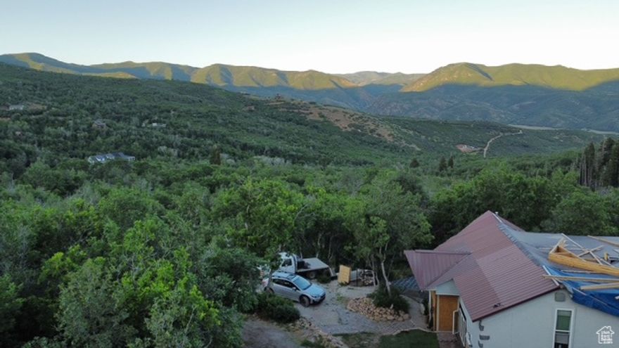Discover a rare opportunity to own a mountain retreat with tremendous potential in the coveted Upper Whitmore community. The home has a Land Patent and 10 shares of water. Situated on a sprawling 3.28-acre lot, this off-grid property offers privacy, breathtaking views, and the chance to build immediate equity with some vision and finishing work. Renovations have already begun, and the interior upgrades that have been completed are tasteful and high-quality-but the home is still a work in progress. With effort, you could turn this into a showcase mountain getaway or a full-time residence. Features include: Paid-off solar panels for fully off-grid living. Radiant floor heating and a tankless water heater for energy-efficient comfort. Some of the best panoramic views in Upper Whitmore. THE HOME IS BEING SOLD AS-IS and will require a cash buyer. However, the seller is open to seller financing options. Ask the agent for details. This is more than just a home-it's a chance to create your dream mountain escape while building value along the way. Bring your tools, your vision, and your sense of adventure-this is the diamond in the rough you've been waiting for. Buyer to verify all square footage that was obtained from an appraisal.