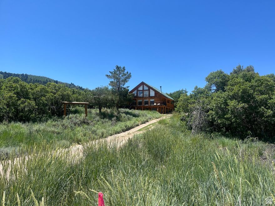 Custom Chappell Log Home located in the scenic Timber Lakes Community. Hand peeled Logs to enhance the fine craftmanship and artistry. A perfect home for large family gatherings and entertaining. This cabin has 3 floors with 2 bedrooms, bathrooms and a family room on each floor. Totaling 6 bedrooms, 4 full bathrooms and 3 family areas. Timber Lakes HOA maintains the roads, including snow removal, which provides year round access. Such a close commute from SLC, Provo, Park City and Heber City. Excellent year round recreation is close by, such as trails for hiking, snowshoeing, snowmobile trails, ATV trails, fishing, boating and skiing, all within 30 minutes or less! This one of a kind custom log home in an amazing location wont last long!