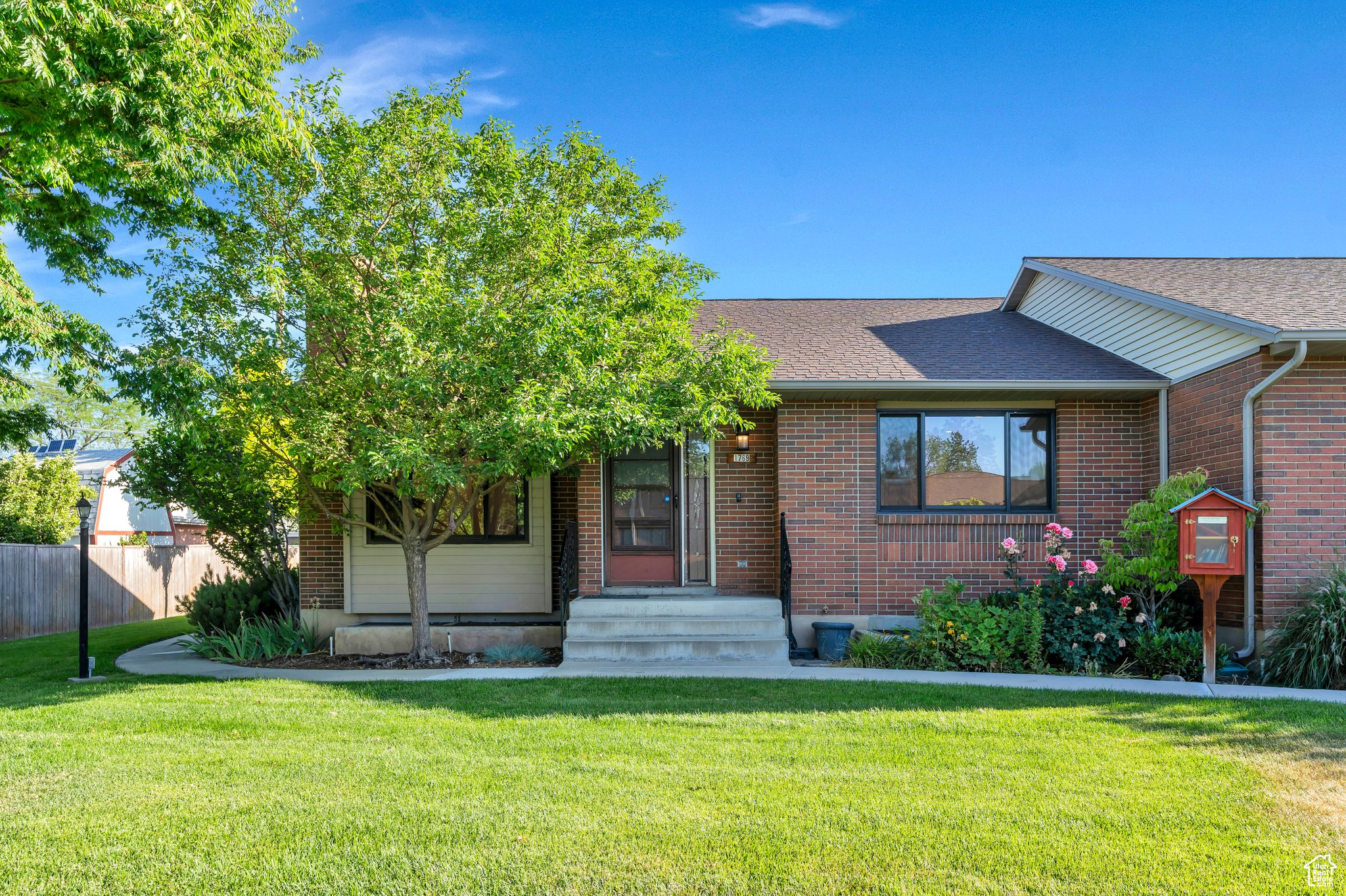 Looking for a home in an incredible neighborhood and less work to maintain the exterior? This 4-bedroom, 2.5-bathroom end unit home located in the desirable Grandview Farm 55+ community that offers that and more! The main floor features a spacious master suite with an en suite bath, double ovens in the kitchen, formal dining room, living room, family room, and laundry room. The lower level includes three additional bedrooms, a full bath, family room, and storage room. Enjoy outdoor living on the covered patio and large grass area around the home. Located in a 55+ community with HOA amenities including a pool, clubhouse, lawn care, roof replacement, and snow removal. A two-car garage with built in storage completes the package. Owner/Agent Square footage figures are provided as a courtesy estimate only and were obtained from Utah County.