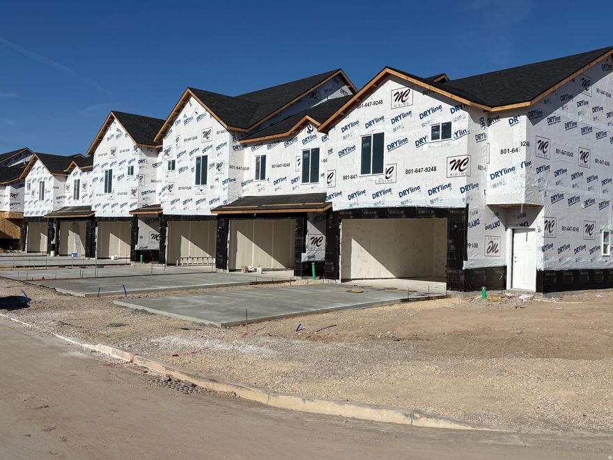 Introducing the Brand New Salt Grass Subdivision! Beautiful New Townhomes Under Construction In West Point With Great Proximity To Shopping & Schools! Functional Floor plan with 3 Beds, 2.5 Baths & Laundry on the second level. Spacious 2 car garage with a "full driveway".  Main Floor Features Open Kitchen & Family Room with tall ceiling & 1/2 bath for your guests. All Units Come with Upgraded Cabinetry with soft close doors & drawers & Quartz tops in kitchen and baths, & more! *SEE AGENT REMARKS FOR PROJECT INFO AND UPDATES