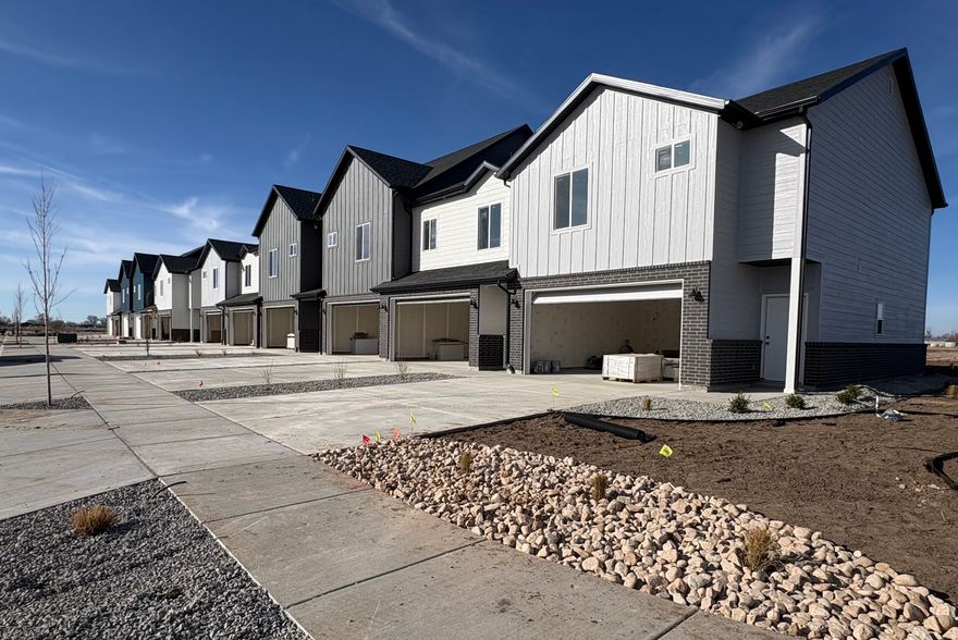 NEARING COMPLETION!!  *BUILDER RATE BUY DOWN OPTIONS AVAILABLE - PLUS GET A FREE FRIDGE WITH ACCEPTED OFFER THROUGH FEBRUARY*.  Welcome to our SaltGrass Townhome Subdivision! Beautiful New Townhomes In West Point With Great Proximity To Shopping & Schools! Functional Floor plan with 3 Beds, 2.5 Baths & Laundry on the second level. Spacious 2 car garage with a "full driveway".  Main Floor Features Open Kitchen & Family Room with tall ceiling & 1/2 bath for your guests. All Units Come with Upgraded Cabinetry with soft close doors & drawers & Quartz tops in kitchen and baths, & more! *SEE AGENT REMARKS FOR PROJECT INFO AND UPDATES