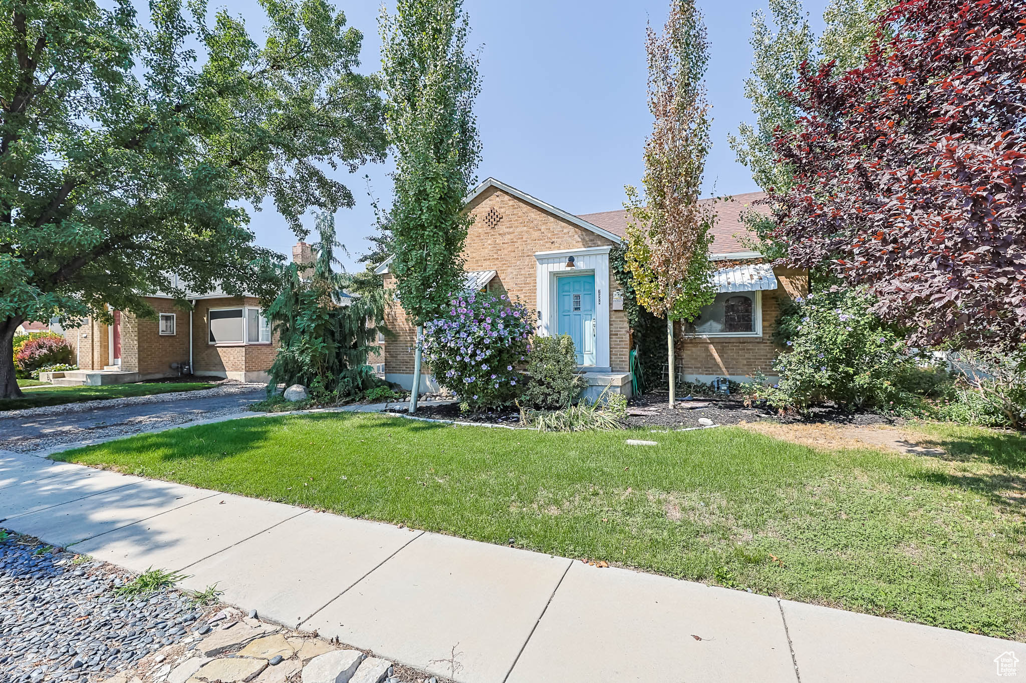 Welcome Home! Classic brick rambler located on a quiet, well maintained street. Features a welcoming living room with hardwood floors and a fire place greet you upon entering. The home also has a full size basement with an extra bedroom, tons of storage and room to grow. Nestled up right against Midvale City Park you wont be able to tell where your large private backyard ends and the park begins. Easy access to the freeways, schools and located in a growing city,