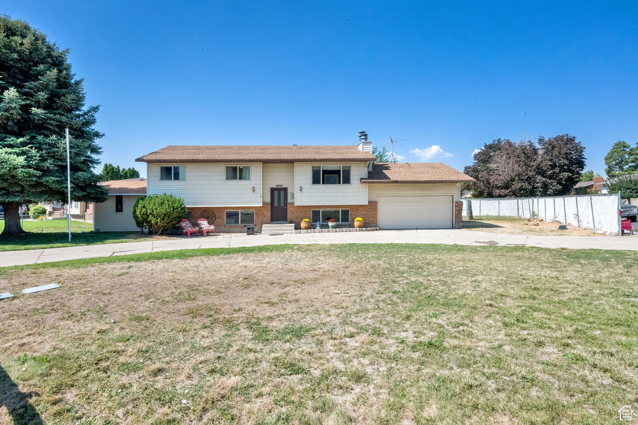 This home sits on a large .29-acre corner lot with a circular driveway, RV pad and spacious front and back yards that make for a great setup for outdoor living. Inside, you'll find 6 bedrooms and 2 living rooms, giving you all the space you need for family, guests or work-from-home setups. The basement has a separate walkout entrance, making it a great candidate for an ADU or mother-in-law apartment if desired. This home is looking for a new owner and it could be you, SCHEDULE YOUR SHOWING TODAY!!!