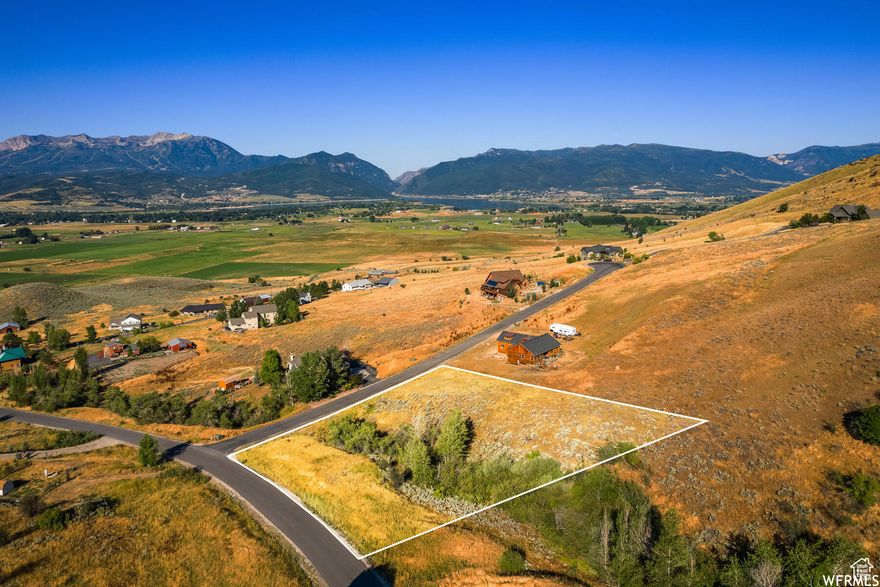 Elevated Expansive Views of the Ogden Valley & Wasatch Mountains.  Bike, hiking, fishing, hunting and horse trails.  This Private Community is approx 2 miles from Pineview Reservior, just a few minutes drive to both Snow Basin and Powder Mountain ski resorts. Stream is seasonal. See HOA Remarks.