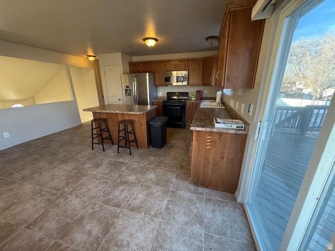 Tiny photo for 8333 S PLUM BLOSSOM CIR W #406, West Jordan, UT 84088 (MLS # 2140158)