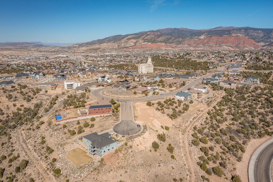 Located in the highly desirable Carmel Canyon Estates, this stunning walk-out basement lot offers one of the best views in all of Cedar City. Backing to dedicated green space, the lot provides unobstructed, panoramic views of the surrounding landscape-perfect for enjoying sunsets and natural beauty right from your future home. With its ideal elevation and premium location, this is a rare opportunity to build your dream home in a quiet, upscale neighborhood. This lot is subject to water acquisition fees. Please contact the Cedar City Building Department for more information.