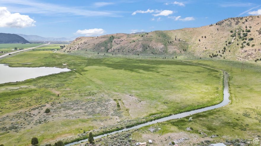 Imagine owning 120 acres of stunning, certified organic since 2022, productive farmland nestled in a mountain paradise. This isn't just land; it's a lifestyle. Located in a prime, easily accessible area, this property boasts incredible, sweeping views of the surrounding mountains that will take your breath away every single day.  Water is abundant and efficient, with a pressurized irrigation system and a canal that runs directly through the property. This ensures your land remains fertile and your crops thrive. Whether you're a seasoned farmer looking to expand or a visionary ready to build a dream estate, this land offers limitless possibilities. Don't miss this rare opportunity to own a piece of heaven on earth.  Buyer to verify all information.  Property will be surveyed prior to close.  Water shares to be split based on land purchased.