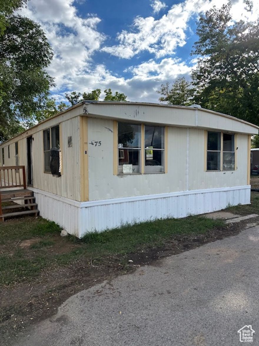 Mile High Village is in Vernal City, close to town and bus route.  Home does need work and would make a good investment opportunity.