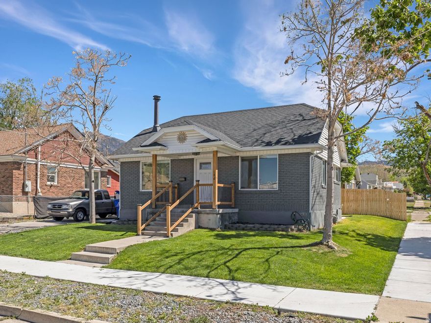 Welcome to this adorable move-in ready bungalow!  This home was recently updated to include new, paint, flooring, cabinets and granite counters.  The roof and AC are less than 3 years old.  The front of the house has a spacious family room and living room that flow directly into the updated kitchen.  There are 2 bedrooms on the main floor and another in the basement. The home sits on a corner lot on a quiet street, but is close to shopping, banking and historic downtown Tooele.  You can own your own spot of ground and not share any walls with neighbors for less than the price of a townhome!  Schedule your showing today!