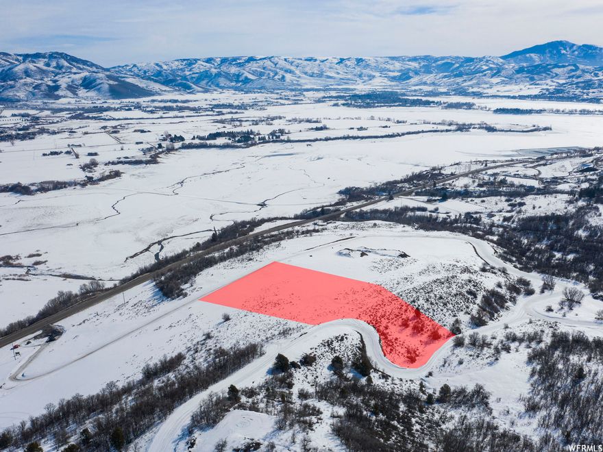 Presenting the quintessential Ogden Valley sanctuary, complete with commanding views of the mountains, valley, and Pineview Lake. This 4-acre building lot in the desirable Osprey Ranch community faces southeast and offers a ridge top homesite and open space to its east. Situated on an open meadow, this gem is perfect for your family's dream home!   Thoughtfully and beautifully designed, Osprey Ranch provides common space and ponds. It also offers near proximity to the year-round recreation hosted by Nordic Valley (4 miles), Powder Mountain (8.5 miles), and Snowbasin (13.5 miles). Plus, you can find yourself in Ogden with a scenic 20 minute drive.   *All property information, boundaries and documents to be verified by buyer.