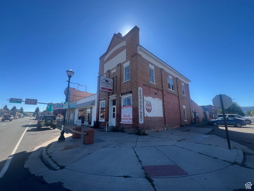 Seller financing available! Seller is motivated, priced reduced, selling do to health issues. This is a fantastic business opportunity that has successfully operated in historic Panquitch Utah since 1993. Panquitch is just a few miles from the mouth of Bryce Canyon National Park and its  2 million plus annual visitors. Building is in very good condition and features a second story 3 bed 1 bath apartment that has just been tastefully remodeled and retains much of the original charm!  There is a fully commercial kitchen on the first floor with a walk in fridge and freezer with ton of storage in the basement. All equipment except dishwasher (leased) included, right down to utensils, plates, and even recipes. This is not only a turn key business in a heavily traveled town, the apartment can serve as a residence or additional income!  Buyer to   Square footage figures are provided as a courtesy estimate only and were obtained from county .  Buyer is advised to obtain an independent measurement.