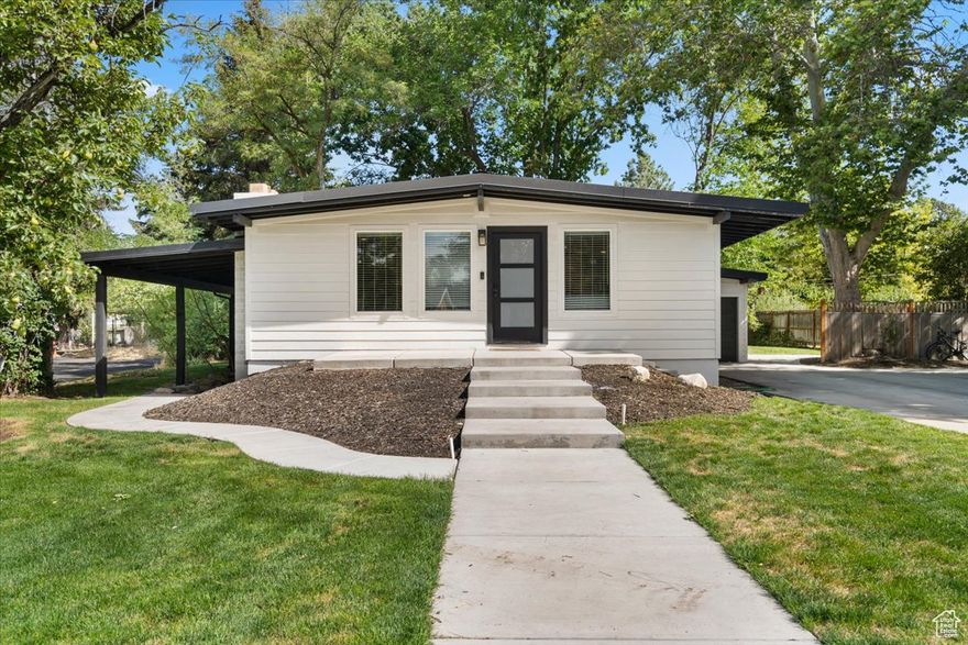 Nestled in the highly sought-after Edgemont neighborhood of East Provo, this immaculate home is just a short walk from top-rated schools and the popular Quail Orchard Park, complete with pickleball courts and playgrounds. Recently renovated, the home boasts a large, gourmet kitchen featuring sleek white quartz countertops and premium stainless steel appliances. The spacious master suite offers a luxurious shower and a generous walk-in closet. Additionally, the property includes a private, fully equipped mother-in-law apartment with its own separate entrance. Recent upgrades throughout the home include new windows, modern lighting, electrical and plumbing systems, updated flooring, HVAC, a new roof, and beautifully redesigned kitchens and bathrooms. Situated on an expansive 0.37-acre lot, the property is surrounded by tall, mature trees, offering both tranquility and privacy.