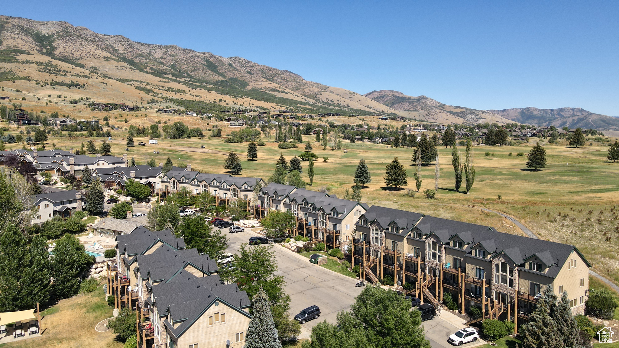 FULLY FURNISHED condo in the highly desirable moose hollow community. Zoned for nightly rentals This is the perfect location, close to Snow Basin, Powder Mountain, Nordic Valley and many hiking and biking trails. Pineview reservoir is minutes away and you will LOVE the community pool and year round jacuzzi just steps away. The Large primary bedroom is on the second level with the laundry room easily accessible. The main open living area is perfect for entertaining with the guest bedroom and guest bathroom as well as the private decks all in close proximity.