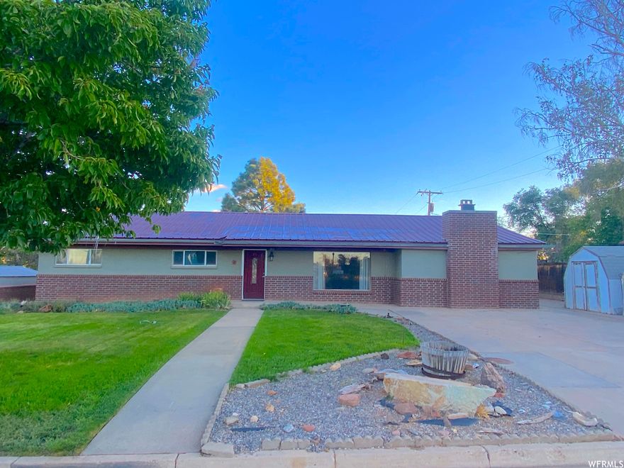A true bargain opportunity! Bring your work gloves and transform this home into your custom dream. Nestled in a quiet cul-de-sac on the edge of town, this 4-bedroom, 1.75-bath home is budget-friendly and ideal for family living or hosting guests. The generous 0.74-acre lot offers space for privacy, gardening, and play. Inside, two welcoming family rooms feature wood and pellet stoves, complemented by a gas furnace for comfort. Three sheds, including one with separate power, provide room for hobbies or storage. Finished currently with handicap accessibility in mind, the home includes ramps and a roll-in shower. Move-in ready with its retro charm, or a perfect canvas for your design vision. Schedule a tour or view the 360 walkthrough and make it yours today!