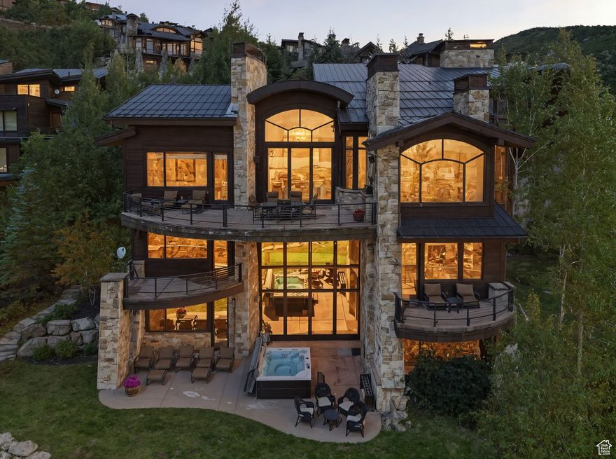 Located in the prestigious gated community of Deer Crest Estates, this Upwall designed mountain modern home offers direct ski-in/ski-out access to Deer Valley, now home to the resort's exciting new expanded terrain. The home is 8,972 square feet on 4 levels of inviting yet sophisticated living. On the main-level you will find the primary suite, formal dining and open concept living and kitchen all enjoying panoramic views of the Jordanelle Reservoir and surrounding peaks.  Designed for both recreation and relaxation, the home features five en-suite bedrooms plus a versatile bonus room, a gym, wine storage, and a dedicated ski prep room for effortless mountain adventures. Expansive entertaining spaces flow naturally to outdoor living areas, allowing you to take in the breathtaking scenery year-round. With world-class skiing at your back door, secure gated access, and timeless mountain modern design, this Deer Crest estate is a rare opportunity to own one of Deer Valley's premier legacy properties.