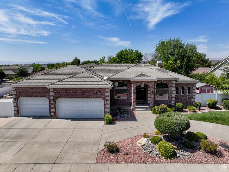 Tucked in a quiet cul-de-sac in Santa Clara's Country Lane, this all-brick custom home blends space, shade, and laid-back living. With over 3,700 sq ft, tall ceilings, and a finished basement, there's room to entertain, stretch out, or cool off year-round. The private pool, huge driveway, and gated rear access give you space for RVs, toys, or extra vehicles. The oversized 3-car garage? Big enough for a boat. You'll love the mature trees, pride of ownership, and peaceful streets-plus you're just minutes from new restaurants, shops, golf, trails, and Frei's Fruit Market if you're feeling nostalgic. Custom home comfort in a classic neighborhood.