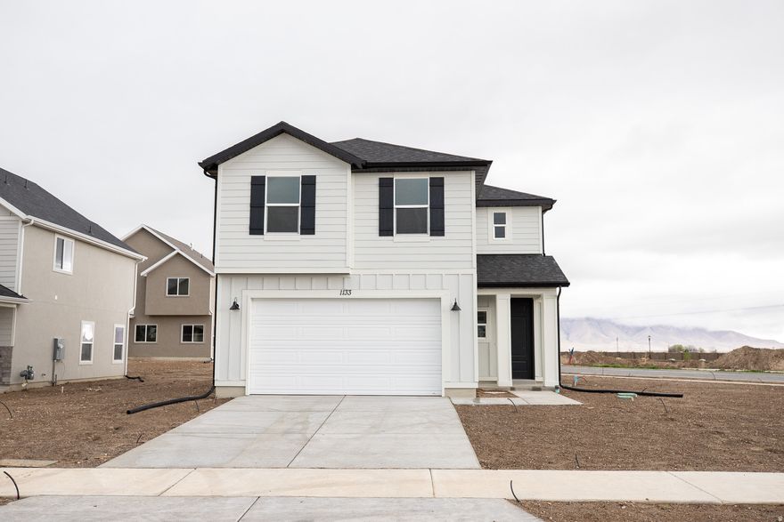 INTEREST RATES STARTING AS LOW AS 4.99% with our preferred lender or $20,000 INCENTIVE towards closing costs, rate buydown, or price reduction regardless of lender! (Talk to agent for conditions.)This is our Must-See New Arrowhead Springs Community in Salem!  This beautiful home was built by Flagship Homes and features 3 bedrooms, 2.5 bathrooms, quartz slab countertops, painted cabinets, laminate flooring on the main level, landscaped front yard, 2 car garage, and backyard (can be landscaped for an additional charge). The primary bedroom has a vaulted ceiling, large walk-in closet, dual sinks, and separate tub and shower! Our Arrowhead Springs community will have a  52-acre park, clubhouses, pools and everything you can think of when it comes to Amenities! This community is close to the Freeway (4 minutes) and is in a beautiful location! Call Seth for more information or stop by our model home at 1074 N 1020 W, Salem, Utah 84653 for a tour. Model home hours: Monday-Saturday 11 AM - 6 PM. Buyers to verify all information. Square footage is from house plans.