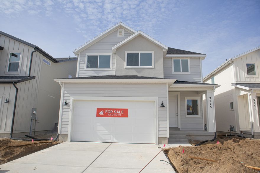 AMAZING $15,000 INCENTIVE TOWARDS CLOSING COSTS, RATE BUYDOWN, OR PRICE REDUCTION REGARDLESS OF LENDER! Must-see Harmony Community in Eagle Mountain! Move-in ready! This beautiful home is being built by Flagship Homes and features 4 bedrooms, 2.5 bathrooms, quartz slab countertops, painted cabinets, laminate flooring on the main level, a large loft on the 2nd floor, landscaped front yard, 2 car garage, and backyard can be landscaped for an additional charge. The primary bedroom has a vaulted ceiling, large walk-in closet, and dual sinks with a separate tub/shower. With an unfinished basement, this home provides space for storage and room to grow. (If preferred, basement can be finished for an additional charge.) 1GB fiber optic internet included in the HOA dues. Call for more information or stop by our model home at 3859 N. Thomas St., Eagle Mountain for a tour. Model home hours: Monday-Saturday 11 AM - 6 PM. Buyers to verify all information. Square footage is from house plans.