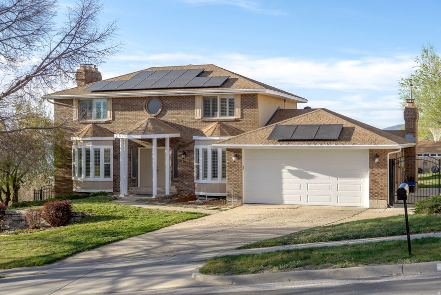 Imagine waking up every morning to sweeping panoramic views of the Great Salt Lake and the Wasatch Mountains, and ending the day with the most amazing sunsets that relax your soul - that's exactly what life looks like at 761 San Simeon Way. This isn't just a house; it's a home that inspires you to live, entertain, and relax in every corner. Step inside to the main floor, where light floods the space and every room feels open and inviting. The kitchen is a chef's dream, with a large island, tons of storage, and space to create meals while staying connected to family and friends. The formal dining room and two living areas, each with a cozy fireplace, make hosting effortless. And when it's time to enjoy the outdoors? The deck off the kitchen living room offers the perfect spot for morning coffee or sunset beverages too - all with those gorgeous views as your backdrop. Upstairs, the primary suite is your personal retreat, complete with a spa-like ensuite, walk-in closet, and more of those stunning views that make every day here feel special. Two additional bedrooms and a full hall bath provide plenty of space for family or guests. Need extra space? The finished basement apartment is a dream - perfect for a teen, in-laws, or rental income. With its own entrance, updated kitchen, living room, den/office, bedroom, bath, and laundry, it's a private little world all its own. Bonus: exterior storage with garage-door access keeps everything tidy and secure. Outside, the magic continues. The yard is a private oasis with fruit trees, berries, grapes, and garden space. Host friends under the gazebo, soak in the hot tub, or simply relax on the deck, taking in the panoramic views that stretch for miles. With an attached 2-car garage, plenty of off-street parking, and all this space for under $1M, this home is truly a rare find in Bountiful. It's a place where memories are made, sunsets are savored, and every day feels like a retreat. Don't just see this home - experience it. Your dream lifestyle is waiting in the Bountiful Foothills.