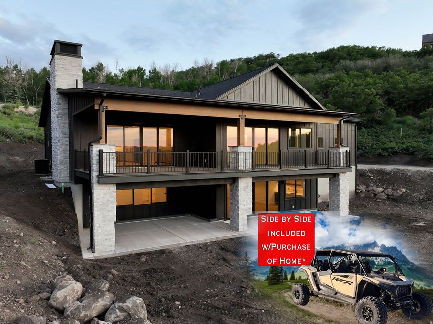 Escape to nature in this beautiful custom home tucked just off a quiet road above Witts Lake. This luxury home offers lake and mountain views. Ride your snowmobile right from your garage to explore thousands of acres of forest land. If hiking and ATV trails are more your style, there are miles of them waiting for you. And don't forget about the lakes to paddle board or the tubing hill in the winter. Relax in the soaker tub while viewing the beauty of nature outside. Whether you're admiring the golden sunsets in the fall, the wildflowers in the spring, the cool crisp summer air, or the gentle snowflakes in winter, this home offers something special in every season. Cozy up by the fireplace on chilly nights or entertain your guest in the heart of the home - a spacious chef's kitchen with its  oversized island. The kitchen seamlessly flows into the great room and large deck. The spacious rooms accommodate your guests. From the walkout basement to the deck above, you can enjoy both wildlife and luxury right at home. With gated access, this home is ideal as a primary residence or a second home getaway. No matter how you choose to use it, this luxury home offers a perfect blend of nature and comfort that you won't find anywhere else. Come See it before it's gone! Security gate requires a realtor to access.