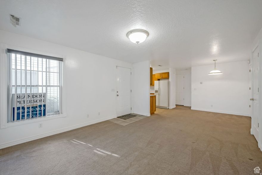 One of the least expensive properties with a garage in Utah County! Discover the perfect blend of functionality and comfort in this well-maintained, spacious 1-bedroom, 1-bathroom main-level condo. - Attached 1-car garage for secure parking and extra storage - Corian countertops and a gas stove/oven for the home chef - Central vacuum system for effortless cleaning - Reverse osmosis water treatment + water softener for high-quality water throughout - Dedicated laundry room with washer & dryer included - Spacious walk-in closet and tons of storage throughout Whether you're starting out, simplifying, or investing, this condo delivers comfort, convenience, and value-all on one easy-access level. If pool access is wanted, can pay other HOA in complex (Brookline) $150 per season, and rent out clubhouse at $25 per use with $100 refundable deposit.