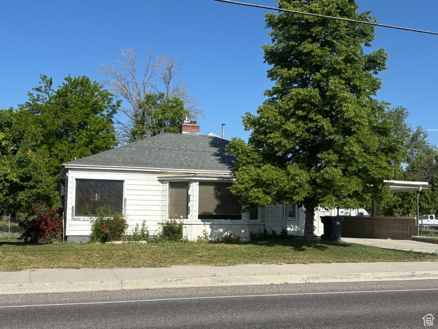 PRICE REDUCED AGAIN! Bring an offer! Lots of room inside this spacious 4 bedroom 2 bath home! Lots of square footage for this price! Large Bedrooms, 1 car deep garage and a carport, Big family room, 2 back doors that open to the back covered patio. Front porch room, large shed, good sized lot - big backyard, garden area, mature trees, large laundry room with cabinets and storage, storage downstairs, located within minutes of grocery store, fast food, schools, etc.   Square footage figures are provided as a courtesy estimate only and were obtained from county records.  Buyer is advised to obtain an independent measurement.